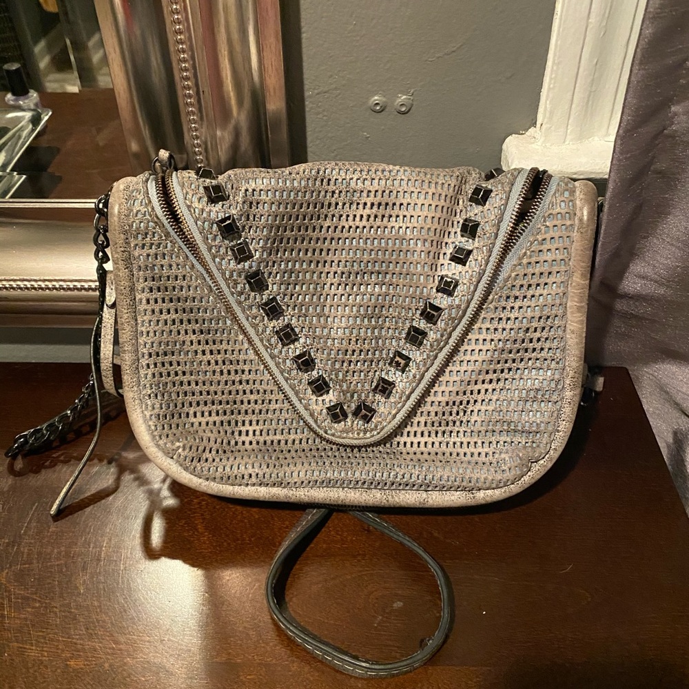 She+lo breakthrough leather studded crossbody bag.